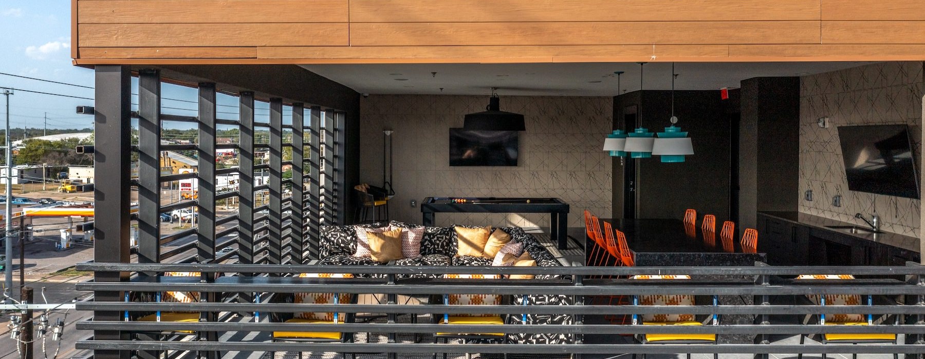 an outdoor seating area overlooking a skyline view